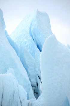 blue ice tower from alaska glacier