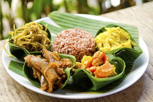 traditional vegetarian curry with brown rice in bali indonesia