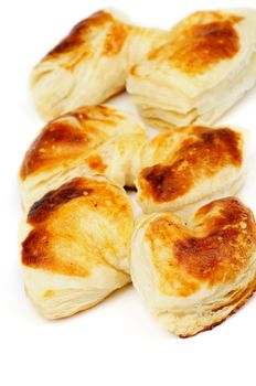 Fluffy Puff Pastry Bakery Bows In a Row isolated on white background