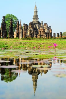 Wat Traphang Thong with reflection in the pond. Sukhothai