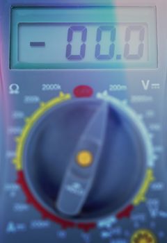 Modern digital multimeter with shallow focus color toned