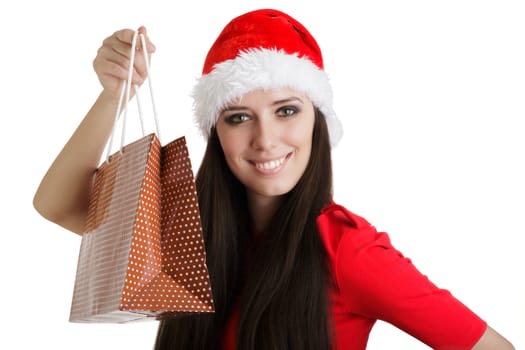 Young woman in Christmas costume on white background.