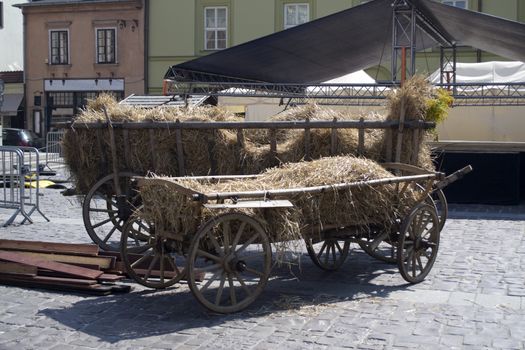 An old traditional wooden cart of hay