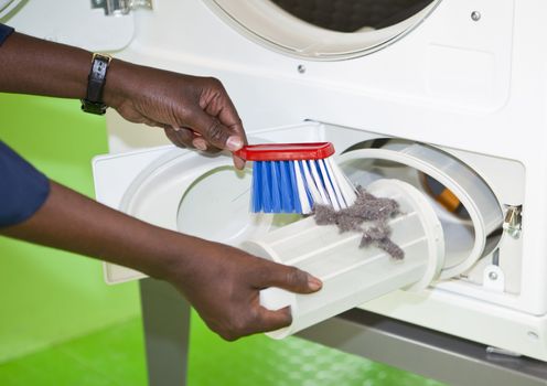 Close up of cleaning the laundromat