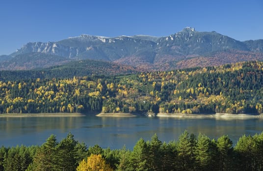 Fresh autumn landscape of mountain and lake, Romania