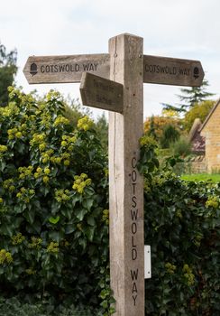 Signpost for Cotswold Way long distance path in Cotswold or Cotswolds district of southern England in the autumn.