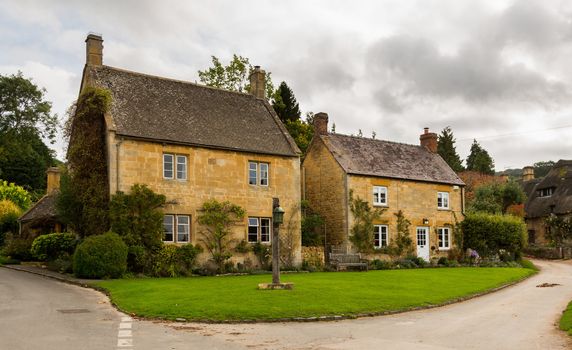 Village green in Stanton in Cotswold or Cotswolds district of southern England in the autumn.