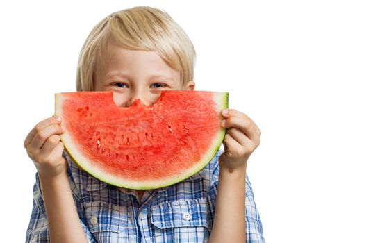 A cute happy smiling boy hiding behind a  big juicy slice of watermelon. Isolated on white.