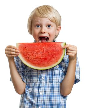 A cute happy smiling boy about to take a bite of  juicy slice of watermelon. Isolated on white.