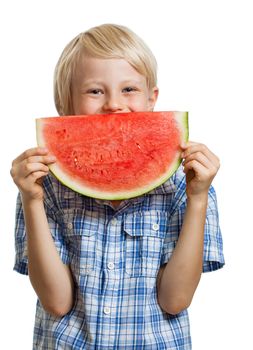 A cute happy boy peeking behind a juicy  slice of watermelon. Isolated on white.