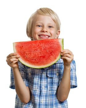 A laughing cute boy holding a juicy  slice of watermelon. Isolated on white.