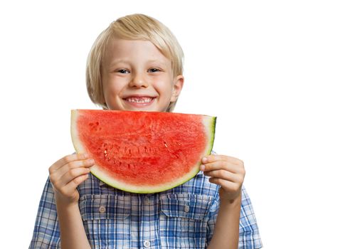 A cute happy smiling boy holding a big juicy slice of watermelon. Isolated on white.