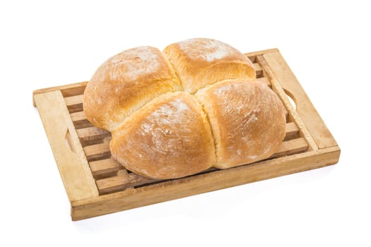 Four Buns Bread on Wooden Cutting Board over white background, Shallow focus