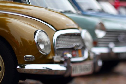 soft focus photo of collectors cars from the 1950s and 1960s