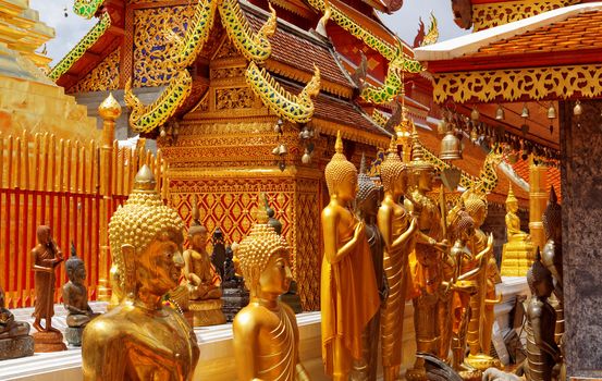 Gold face of Buddha statue in Doi Suthep temple, Chiang Mai, Thailand. 