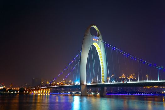 Night scene of Liede bridge with brilliant spot light in Guangzhou city of China 