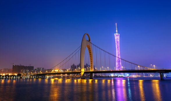 Zhujiang River and modern building of financial district at night in guangzhou china. 