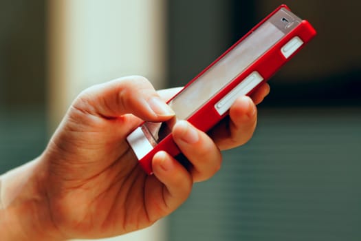 Mobile phone in man hand 