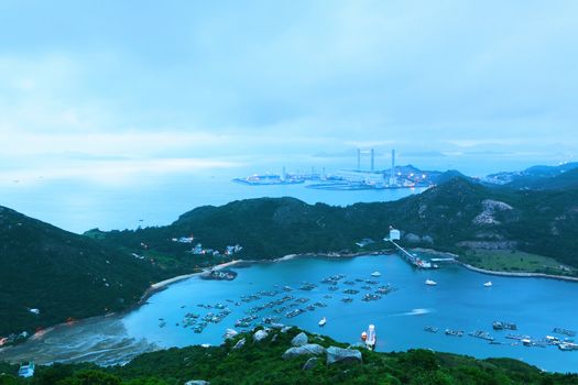 Landscape. Sunset over the mountains and the sea in  h ongkong