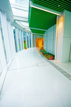 Hall of business building with light from window 