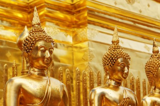 Gold face of Buddha statue in Doi Suthep temple, Chiang Mai, Thailand. 