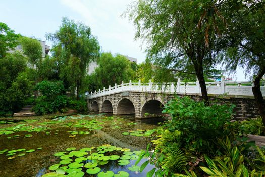 stone bridge in an Asian garden 