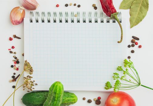 Notebook with recipes and shopping list in the kitchen