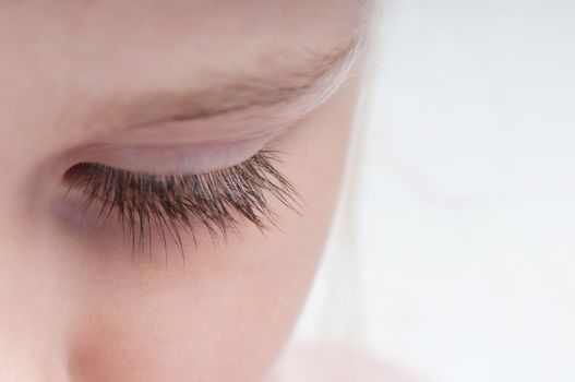 Closeup shot of beautiful long girl's eyelash