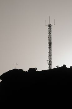 Some Silhouetted Antennas on the top of a Hill