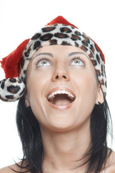 Female Santa laughing on a white background
