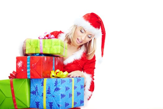 Blong in the red Santa costume holding colorful boxes with Xmas gifts