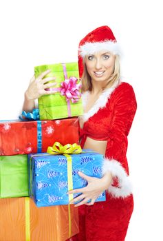 Smiling lady in Santa Claus costume with Christmas gift boxes