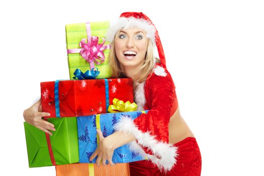 Happy lady in red Santa Claus costume holding the gift boxes on a white background