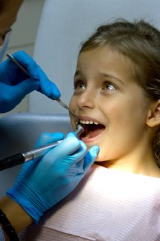 a girl at the dentist.