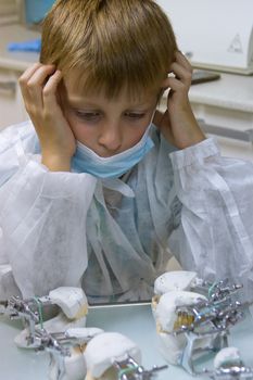 8 years old boy wants to be an orthodontist. Choosing a profession