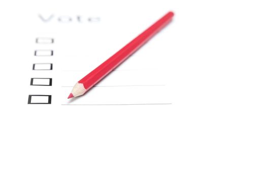 Voting bulletin with red pencil to make choice. Close-up photo