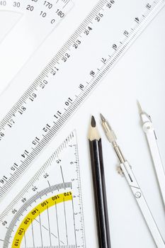 Drawing tools on a paper. Close-up photo