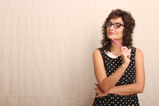 Portrait of a pensive woman in a vintage dress.