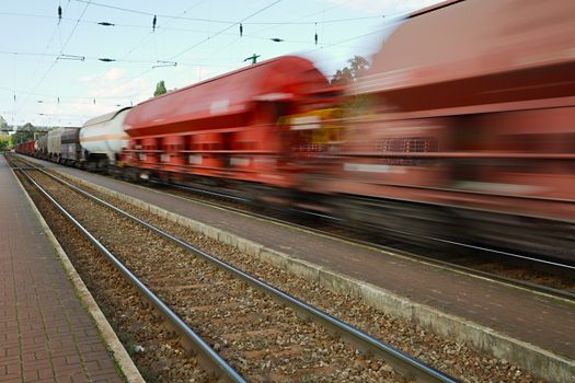 Freight train passing by with blur