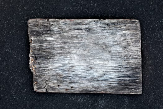 Small Wooden Board on the dark background