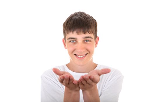 Handsome Teenager showing his Empty Palms Isolated On The White Background