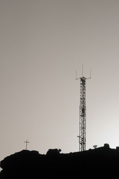 Some Silhouetted Antennas on the top of a Hill