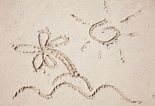simple sun & island drawing on the sand on the beach