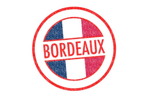 Passport-style BORDEAUX rubber stamp over a white background.