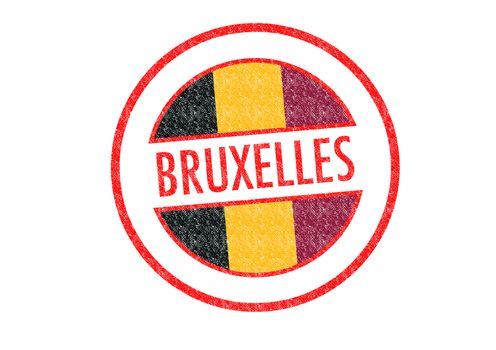 Passport-style BRUXELLES rubber stamp over a white background.