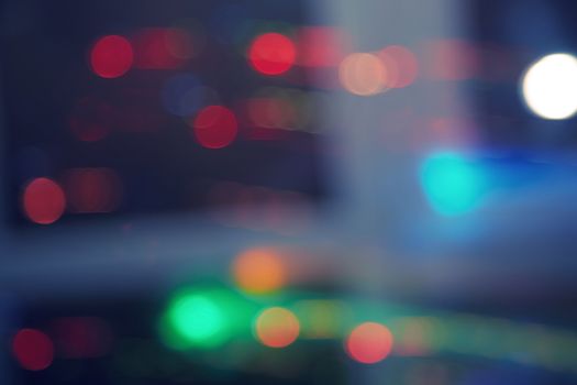 Abstract background with colorful spheres of defocused illumination