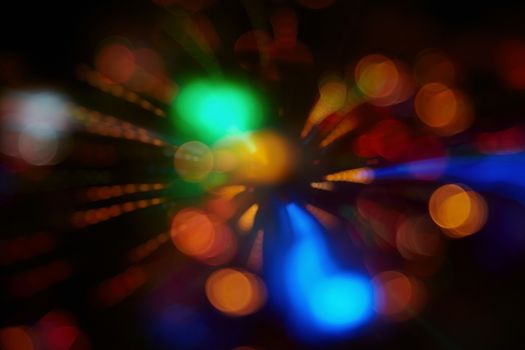 Abstract background with colorful spheres of defocused illumination