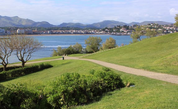 panorama of a coastal town by the sea with its beach and mountains