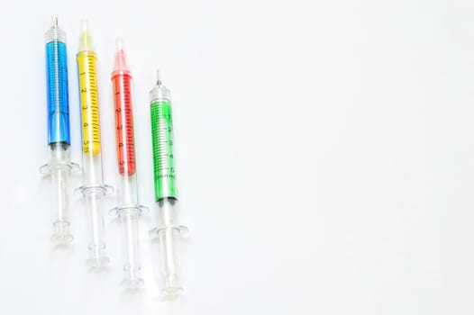 Medical syringes on a white background