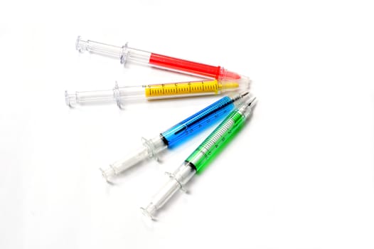 Medical syringes on a white background